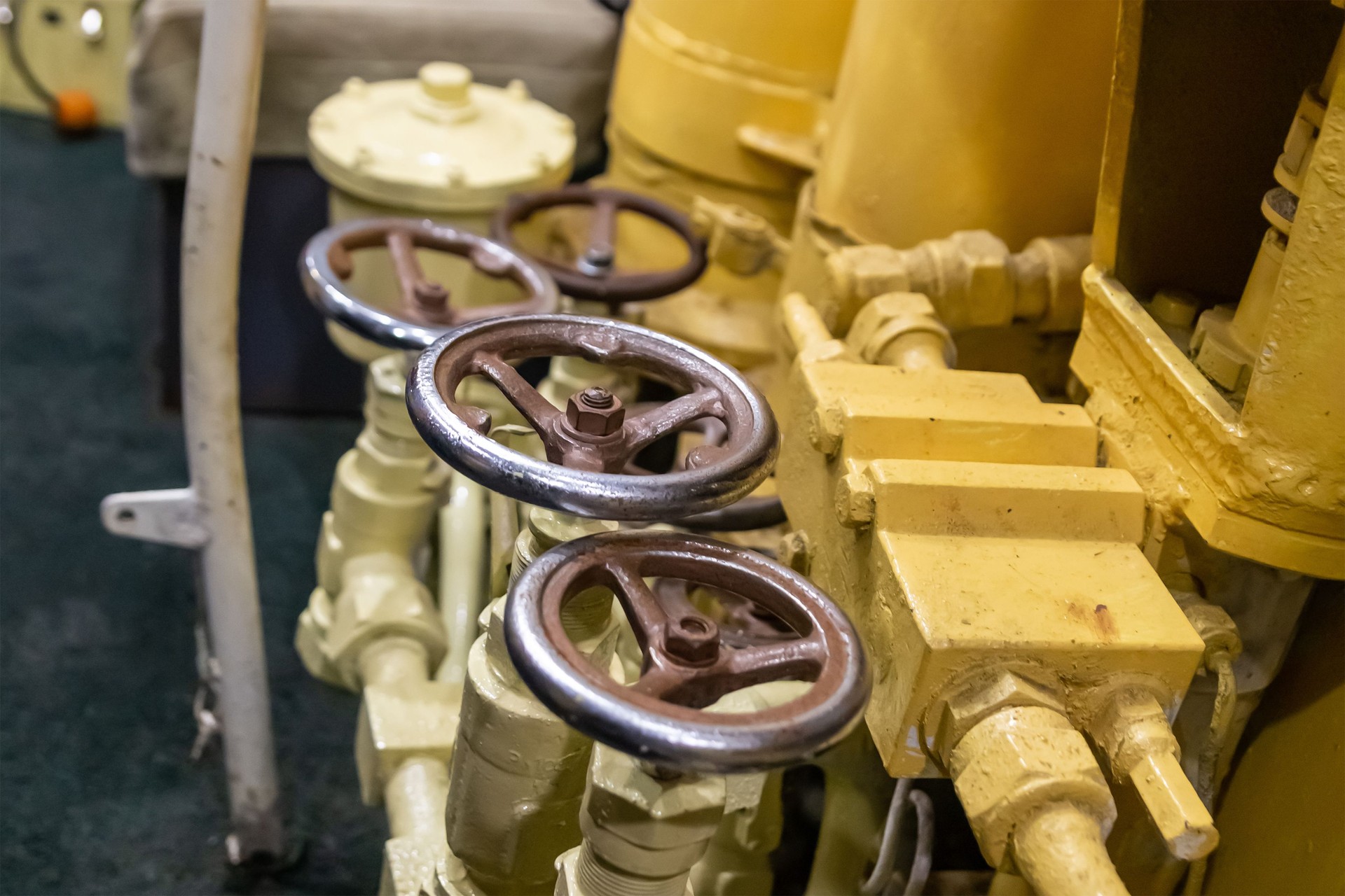 old shabby iron valve for adjusting the hydraulic pressure of a submarine