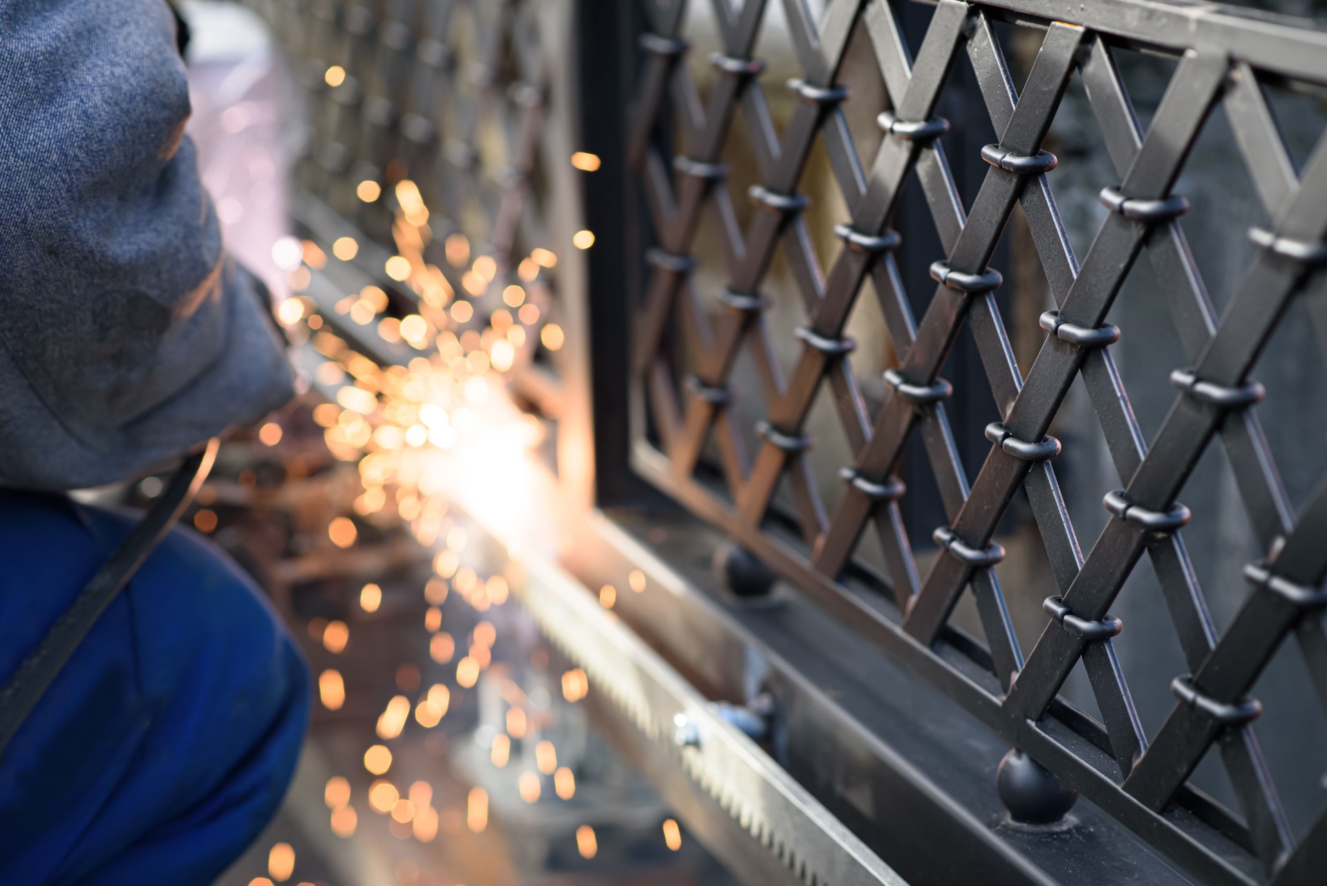 Welding the steel gear racks to gate. Last phase before setting up an automated gate operator. Professional service of installation and maintenance of automatic cantilever sliding gate